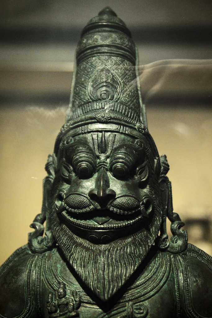 The green deposits on this copper-alloy Narasimha idol refect a passage of time and have therefore been retained since they do not pose any risk to the object itself.